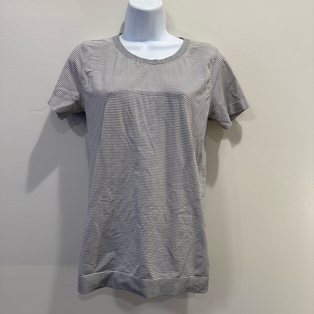 Lululemon Striped Top. Size 8-10. Good condition.